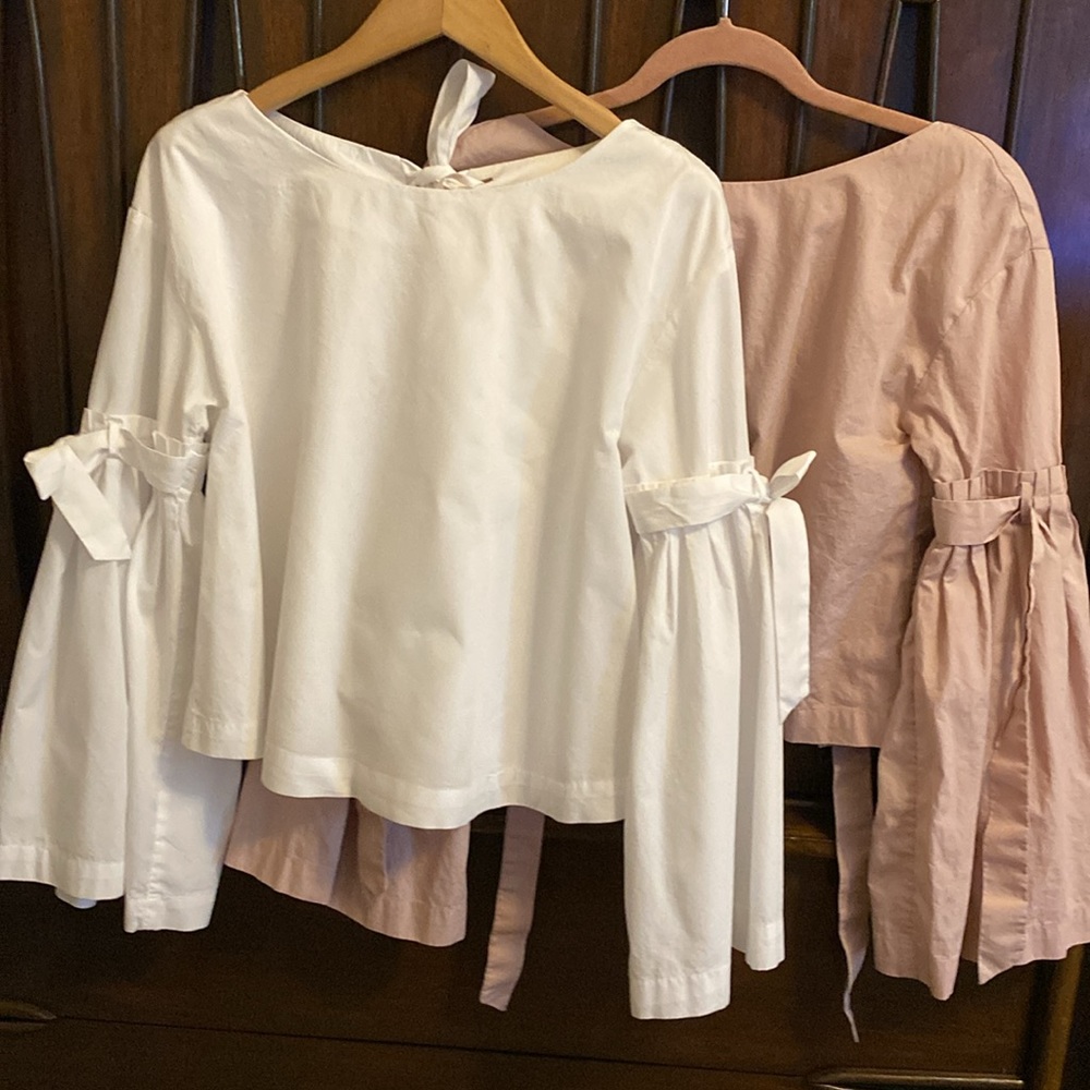 Free People white or pink bell sleeve top.